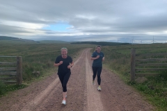 Julie & Kirsty smiling through the pain- Deadwaters 2021